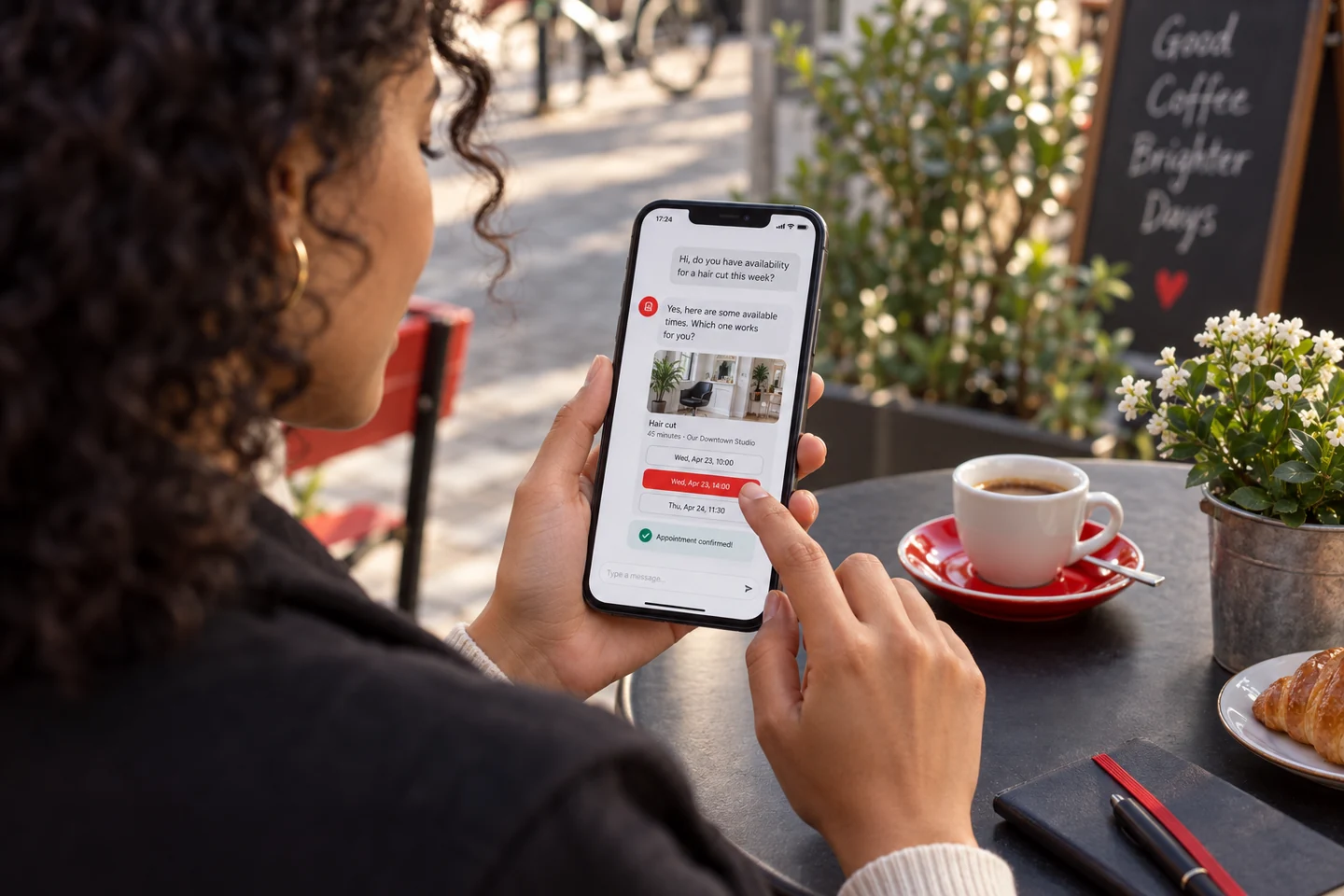 A café customer uses a messaging assistant to choose and confirm an appointment on her phone.